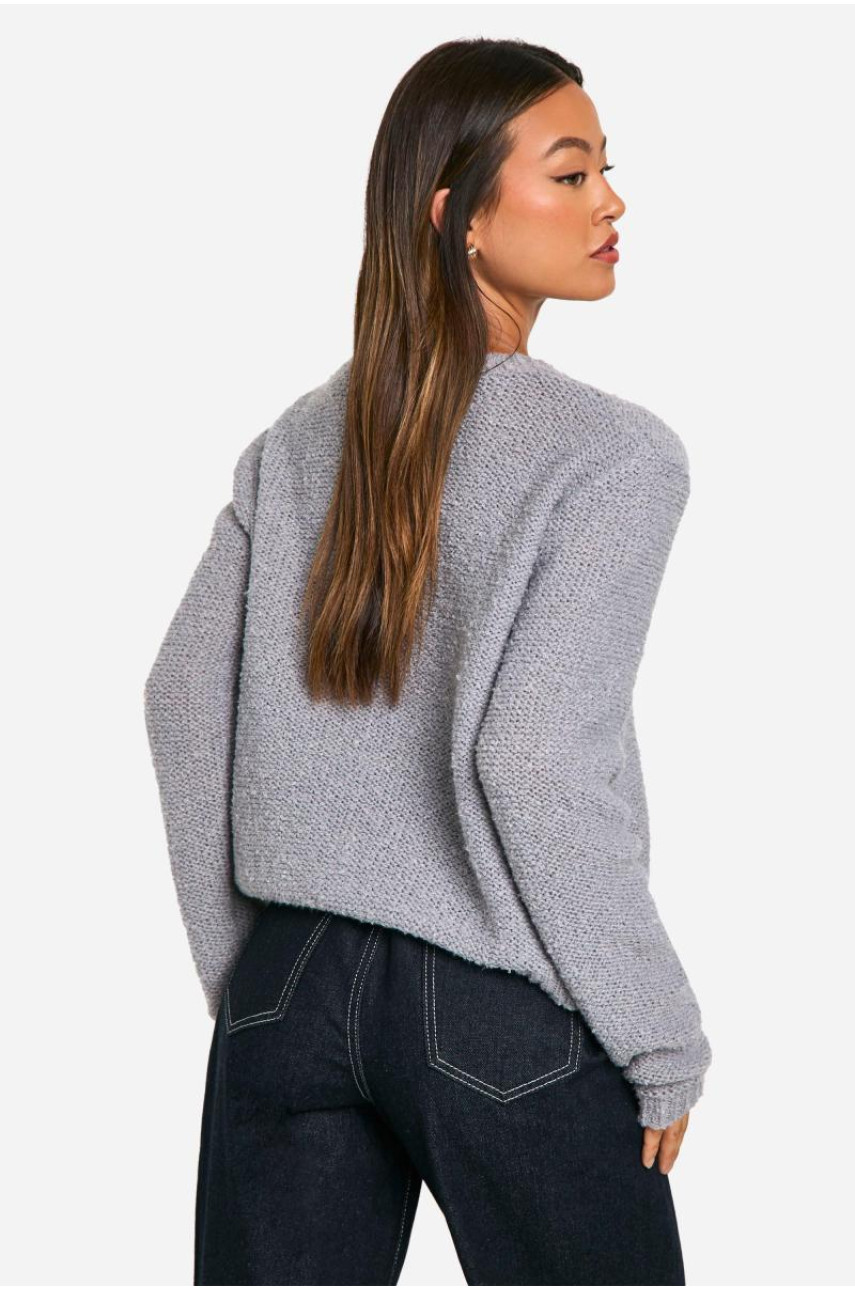 Високий в'язаний джемпер з букле