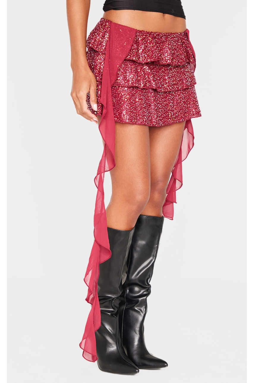 Міні-спідниця бордового кольору з оборками та паєтками
