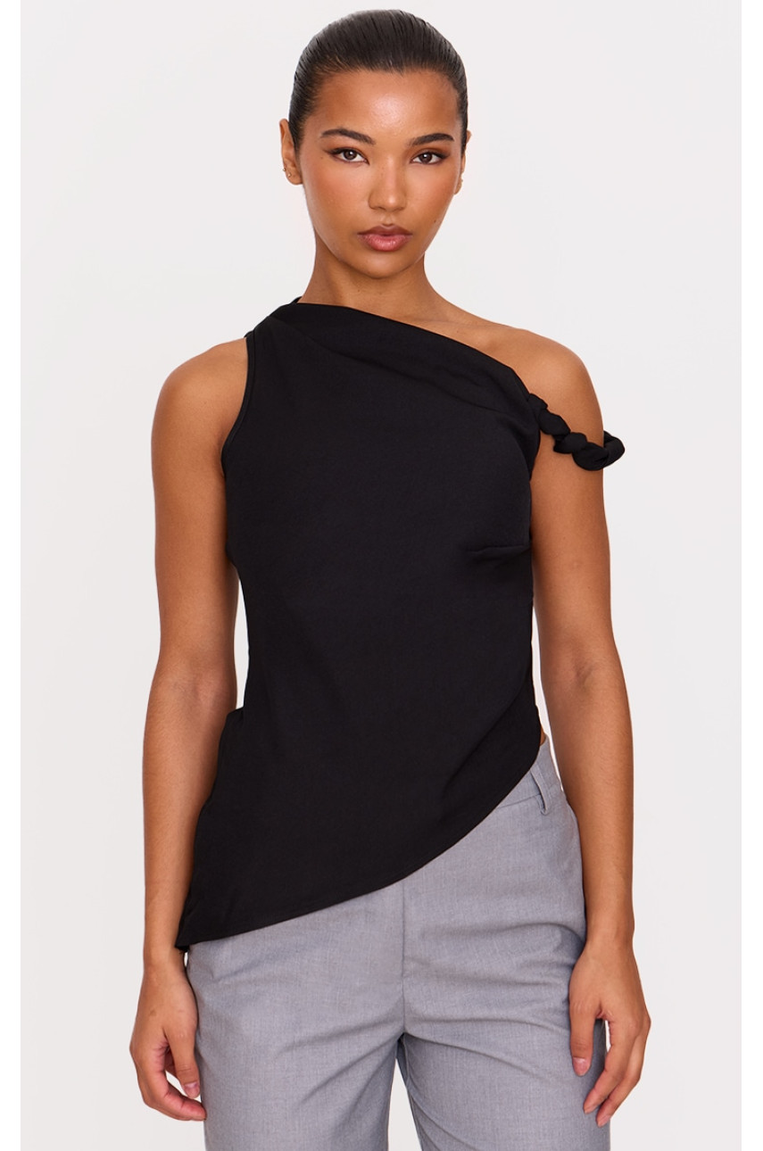 Довгий топ з рюшами з чорним плетеним асиметричним подолом