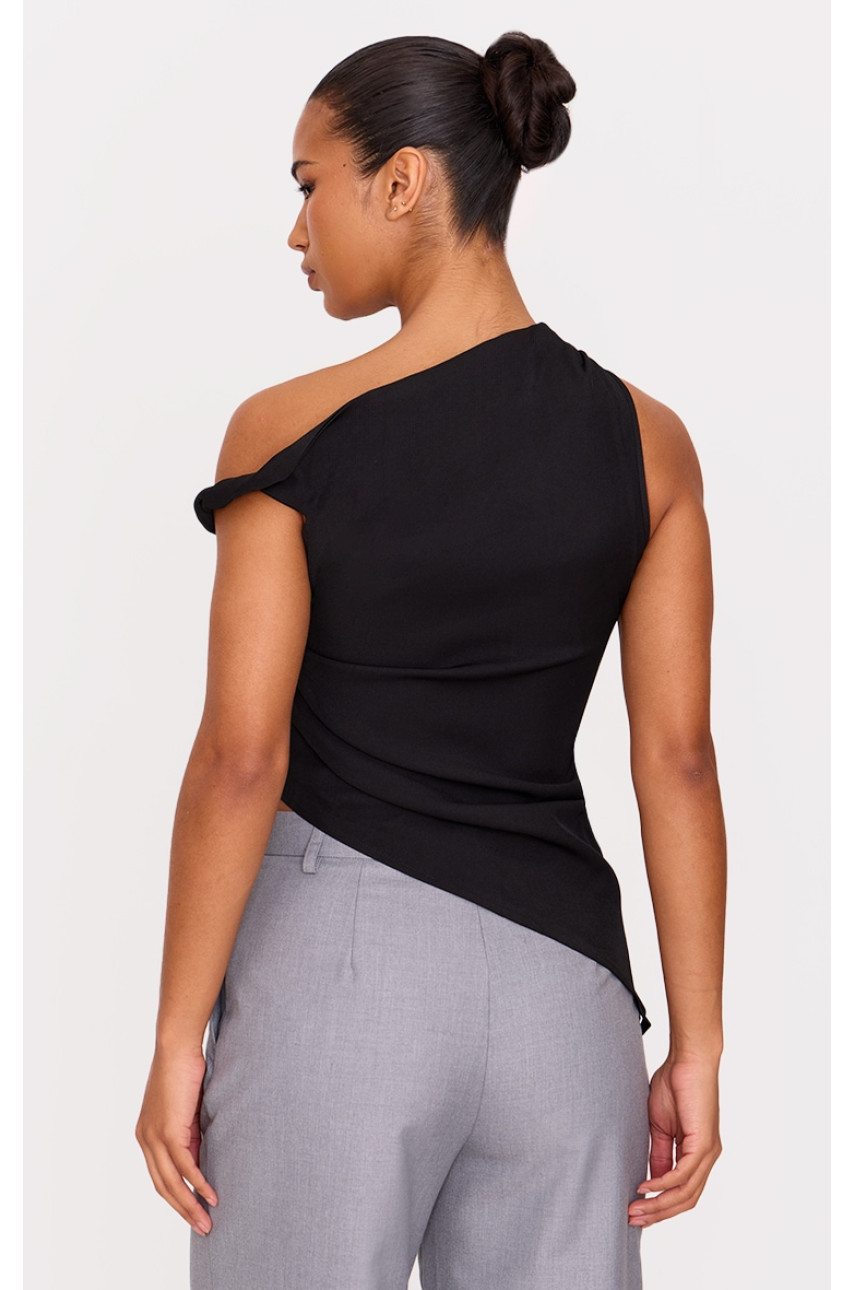 Довгий топ з рюшами з чорним плетеним асиметричним подолом