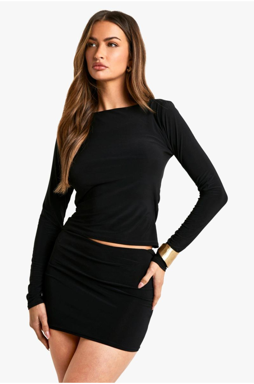 облягаюча міні-спідниця з рюшами