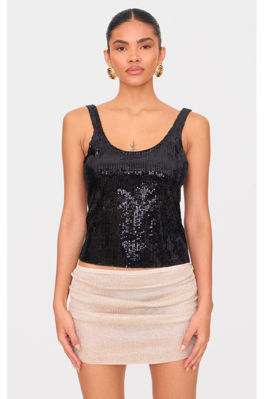 Золота прозора трикотажна міні-спідниця з рюшами з паєток