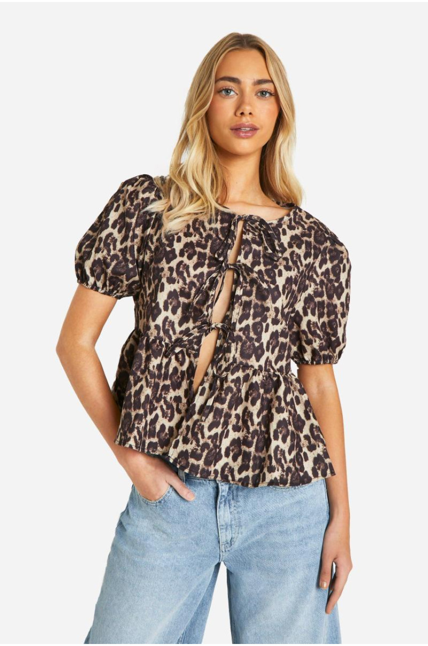 Блуза з леопардовим рукавом і метеликом