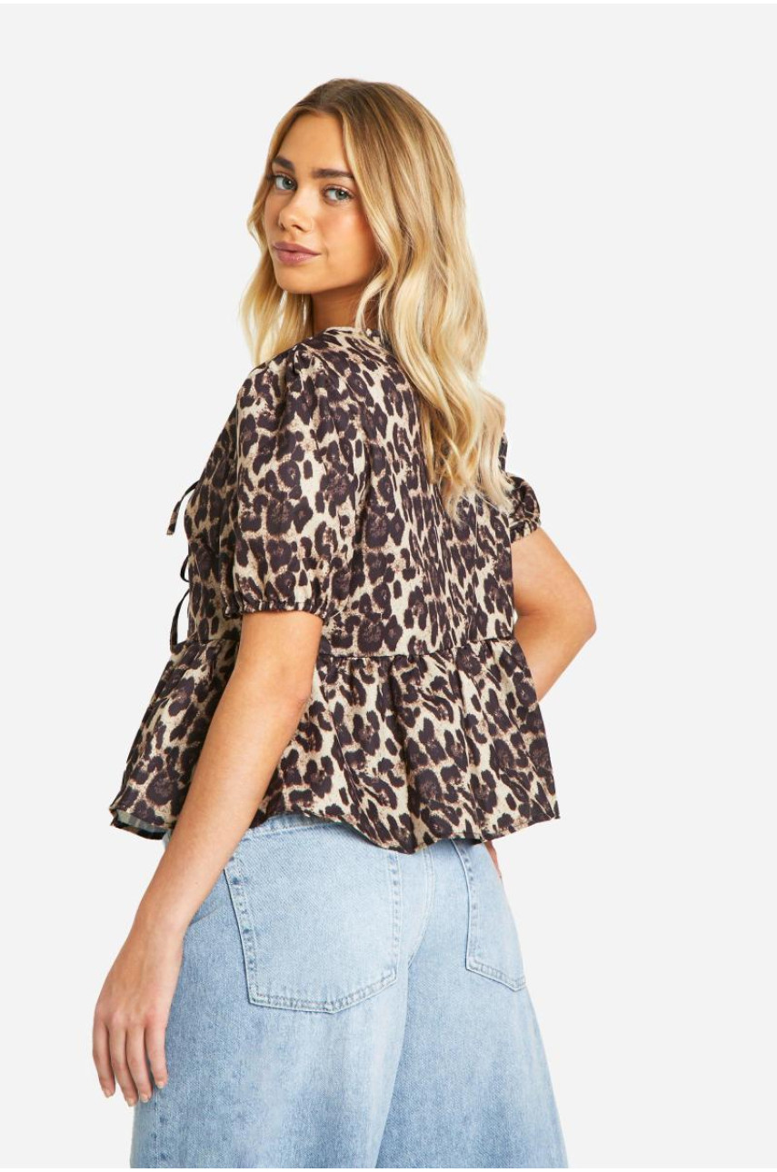 Блуза з леопардовим рукавом і метеликом