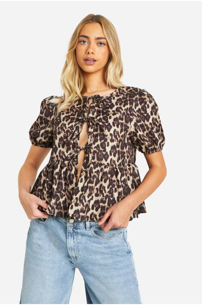 Блуза з леопардовим рукавом і метеликом