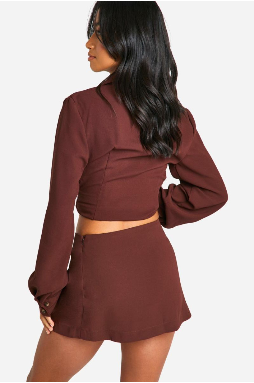 Маленька крепова міні-спідниця