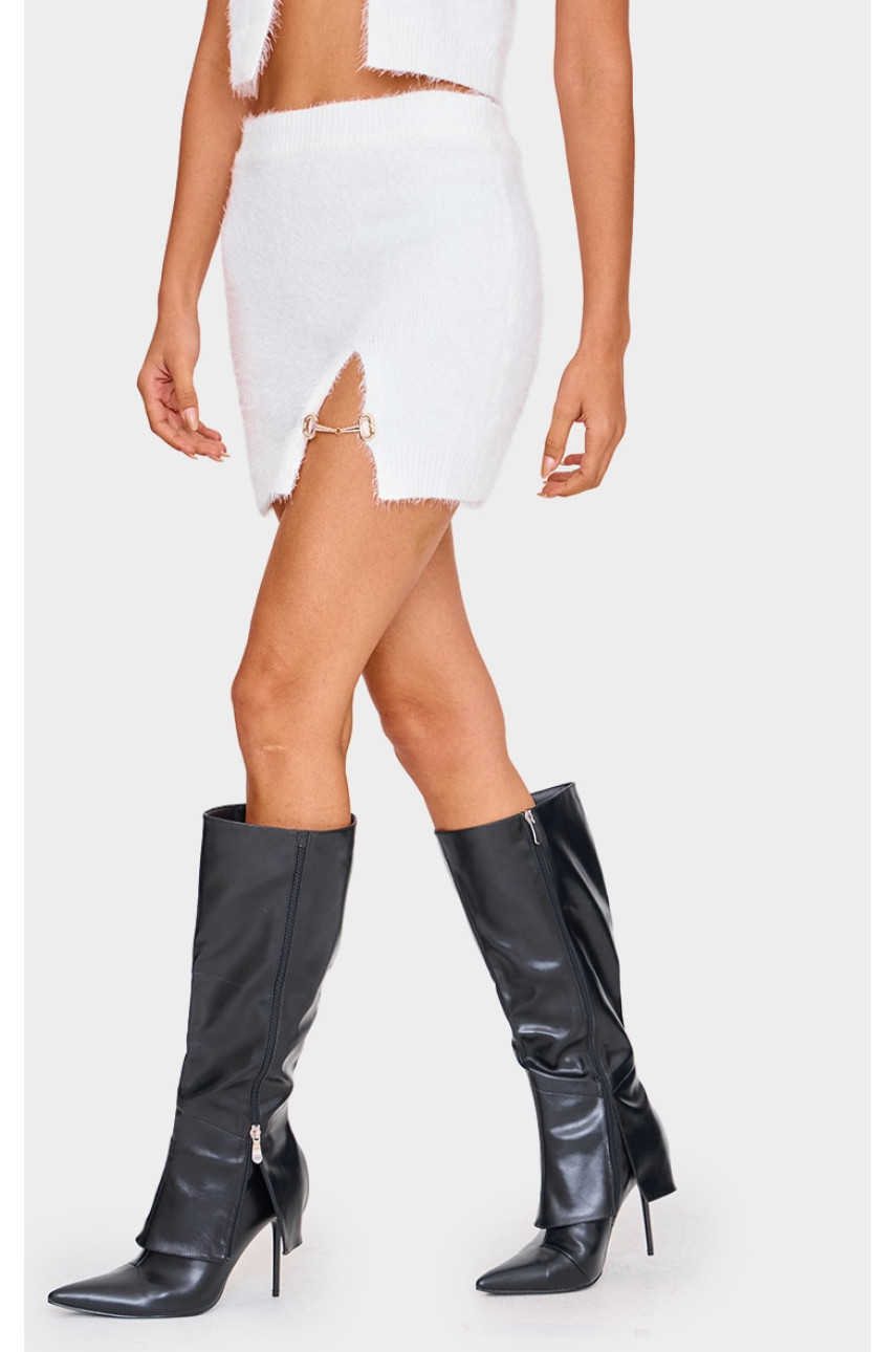 Біла пухнаста трикотажна міні-спідниця з прикрасами