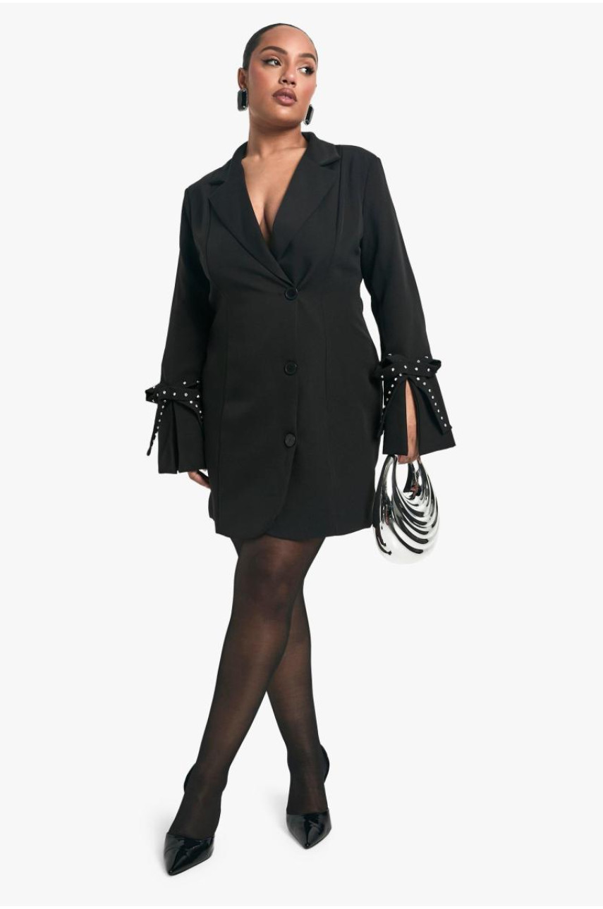 Сукня-піджак з діамантами та манжетами