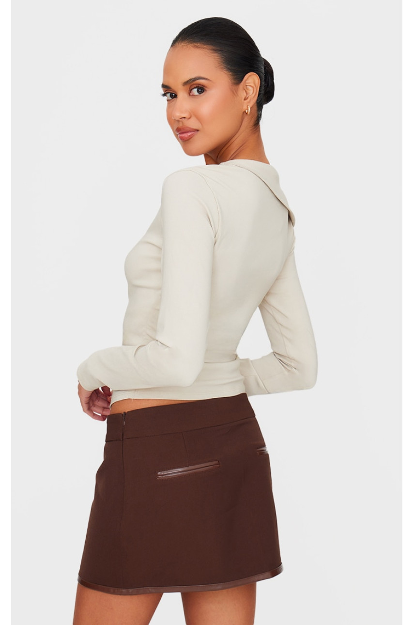 Кремовий бенгальський асиметричний довгий топ із рюшами