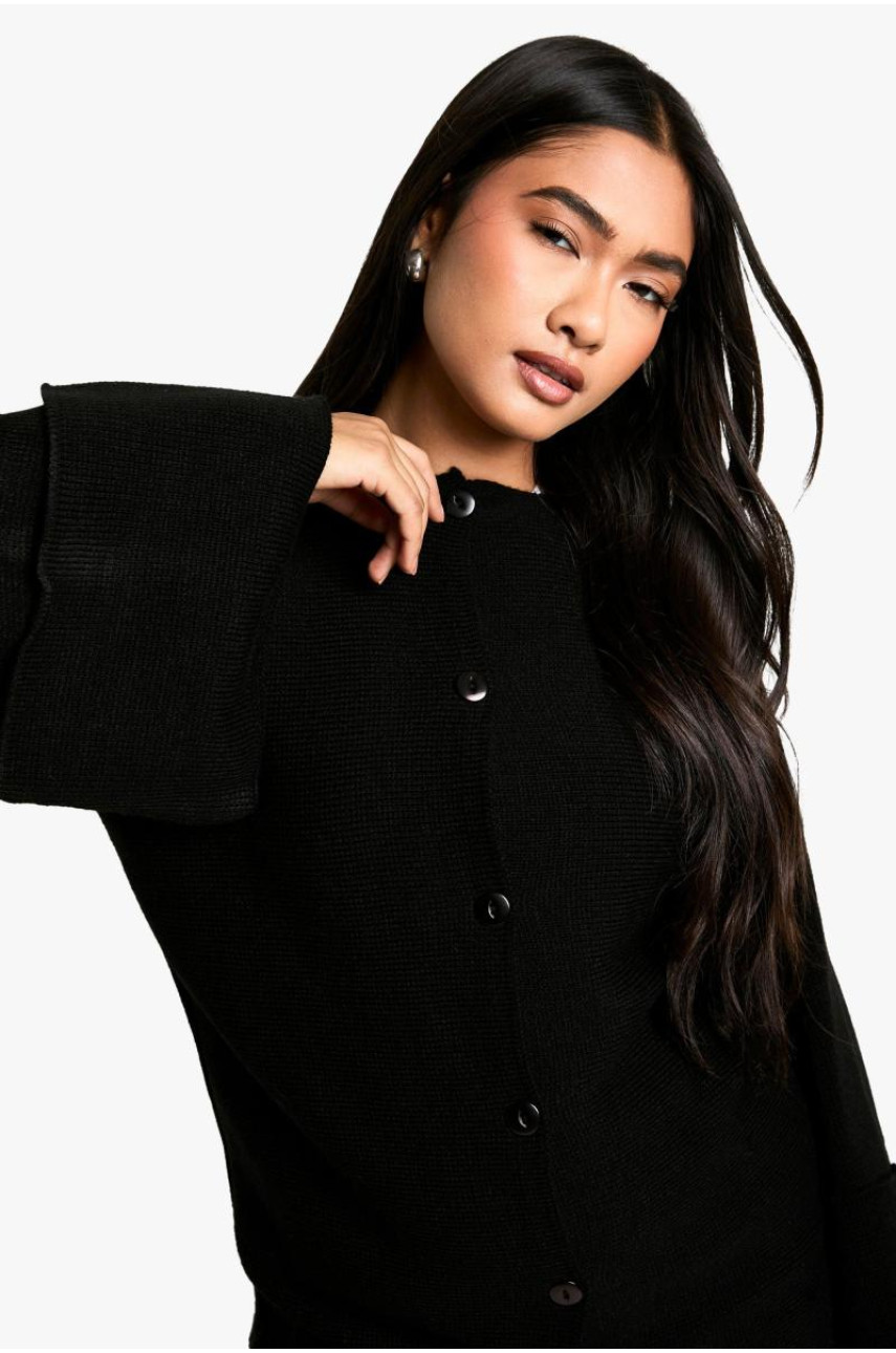 В'язаний кардиган з довгим виворотом і манжетами