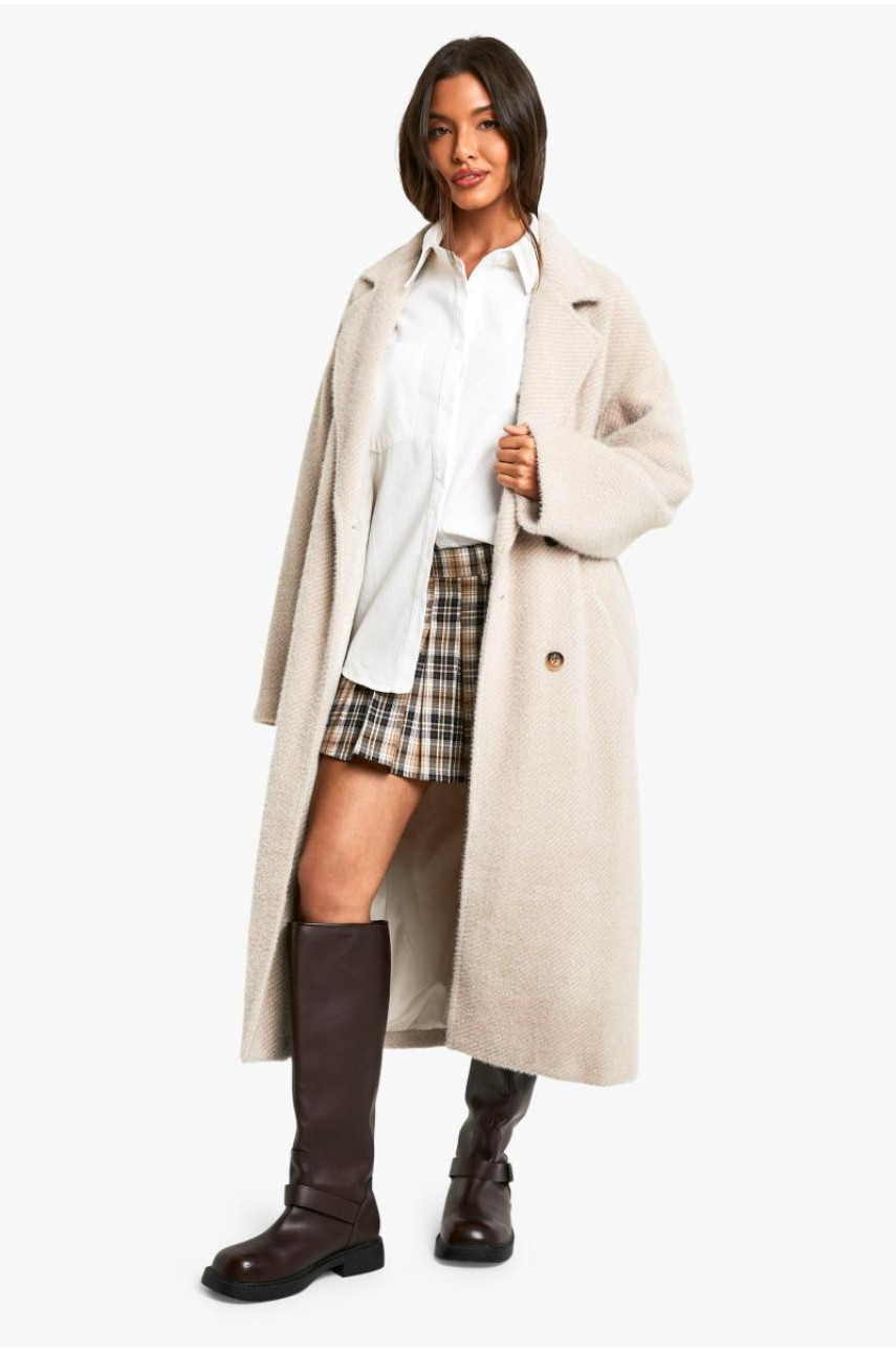 Довгобортне двобортне пальто з фактурою